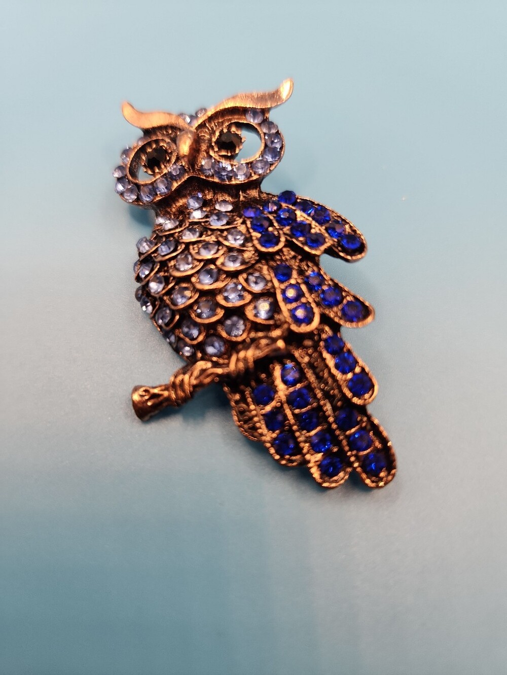 Rhinestone Owl Brooch Rose Gold Tone with Royal Blue Crystals